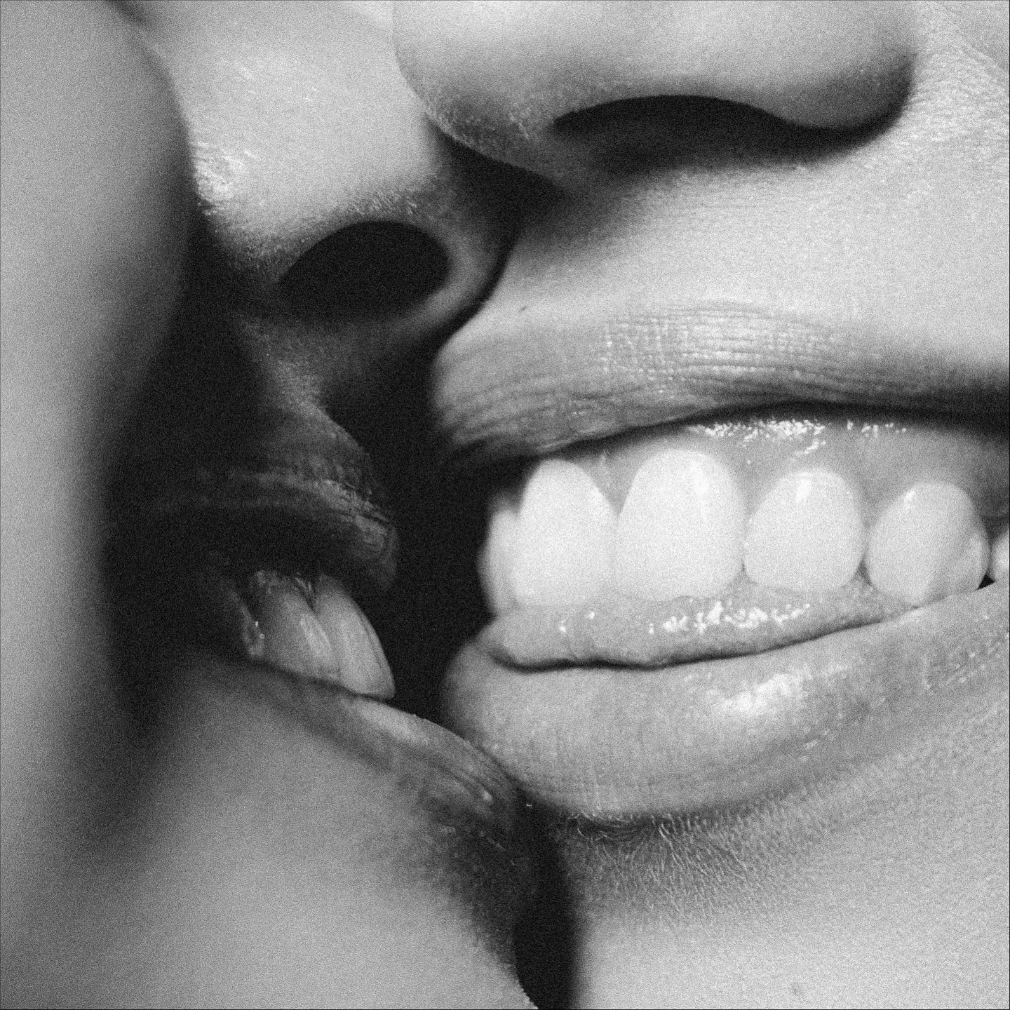Extreme close-up of two faces meeting